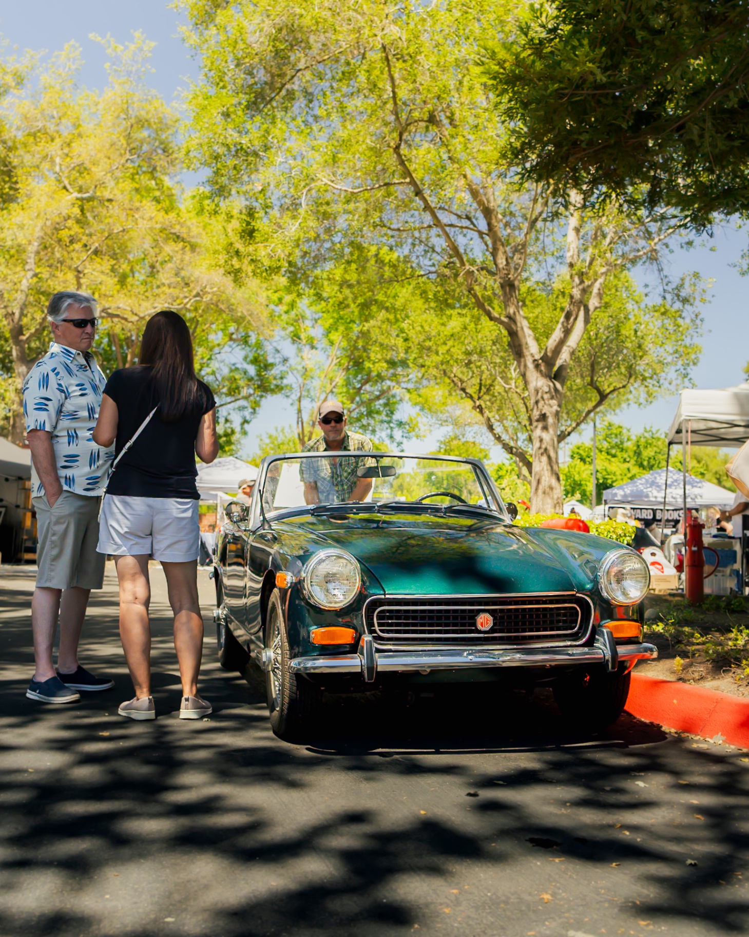 British racing green MG Midget on display