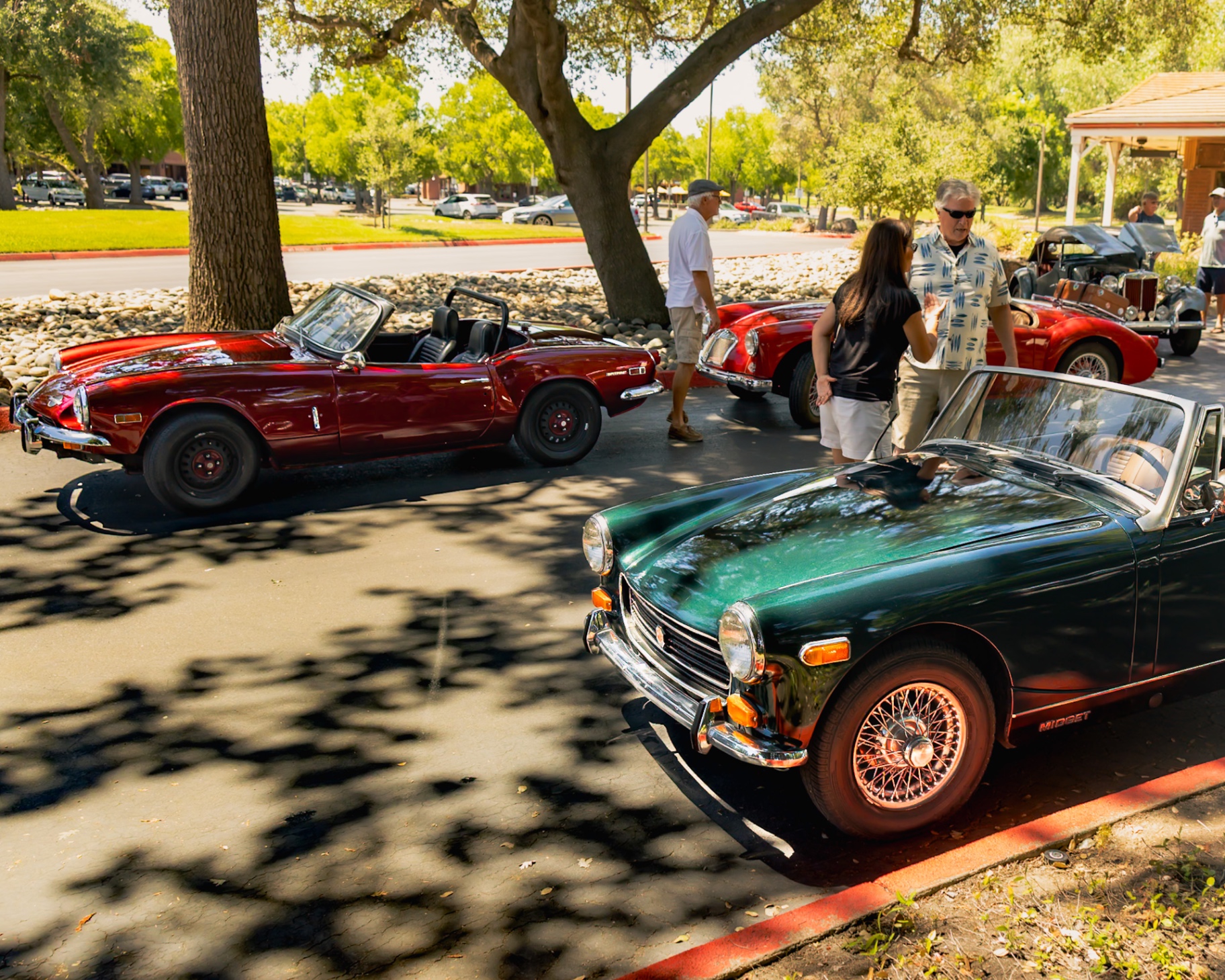Lineup of British roadsters — Triumph Spitfire, MG Midget, and more